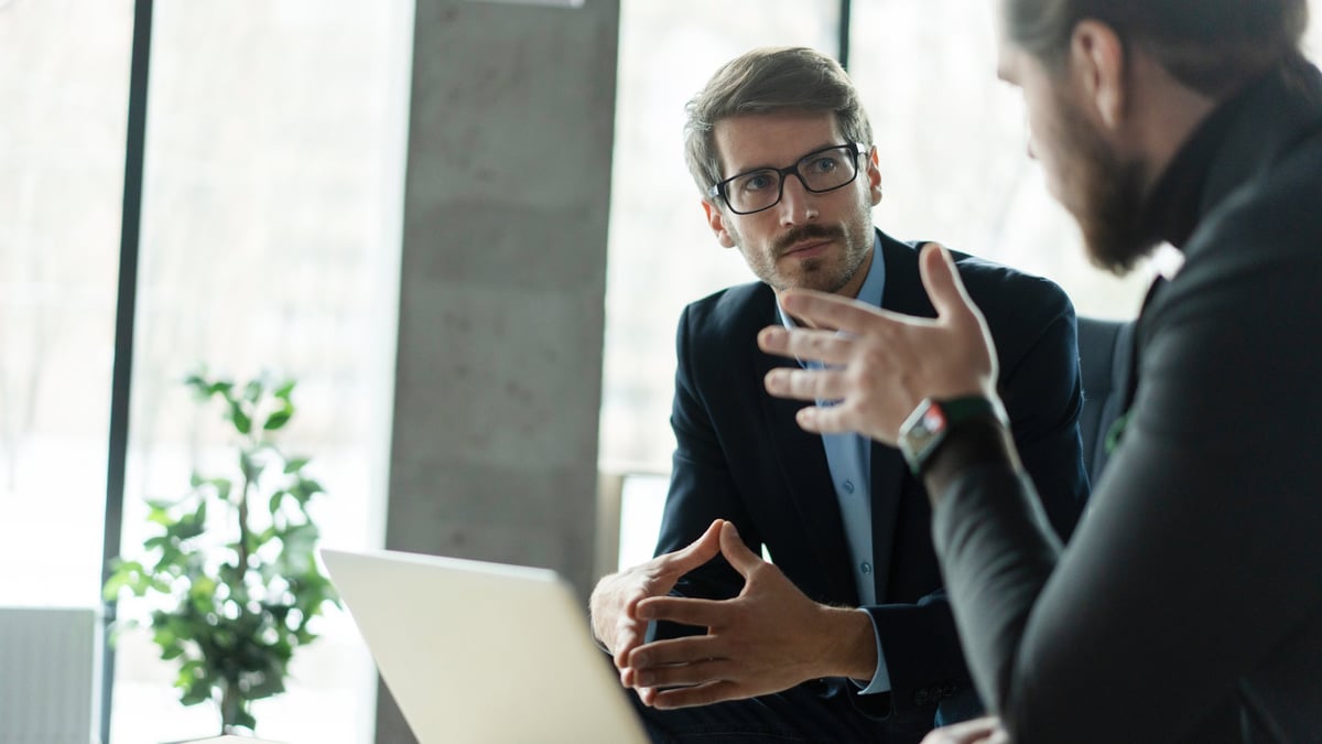 Business partners in conversation in a modern office